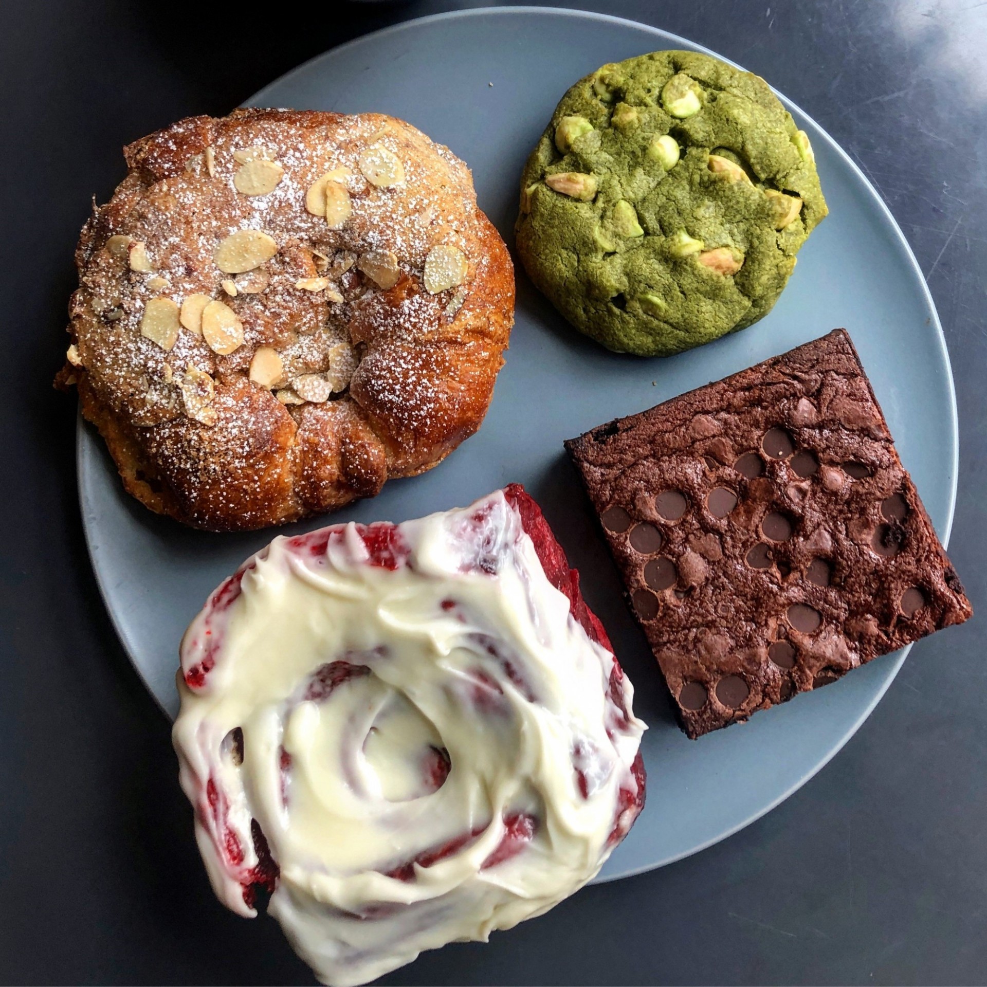 Apple cinnamon french toast croissant, matcha cookie, gluten-free brownie, and red velvet cinnamon roll