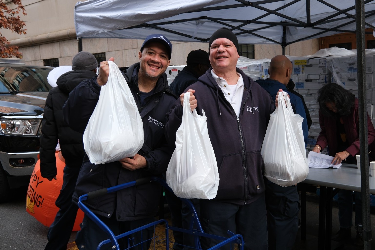 Facilities and Operations employees picking up their turkeys
