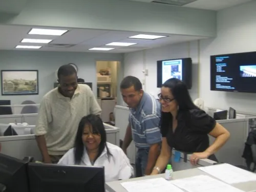 Facilities Services Center Coordinators Paris Renaud, Juliette Hutchinson and Eric Nieves and Supervisor Wanda Roman are on the front lines with clients every day. 