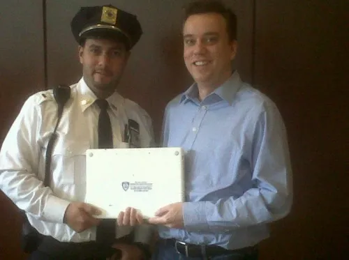 From left, Public Safety Lieutenant Daniel Ayala and SIPA student John Burnett. 
