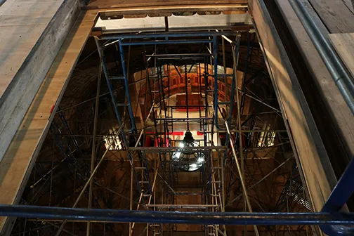 A platform scaffold has been installed in the dome, to facilitate removal of the stained-glass windows and restoration of the dome ceiling tiles