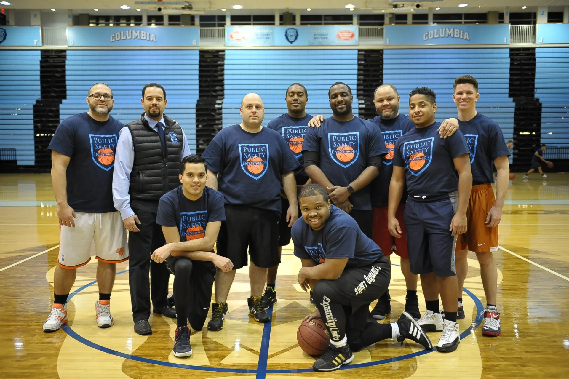 Last year's championions, the Public Safety Enforcers, pose together before their game against the Facilities Tigers.