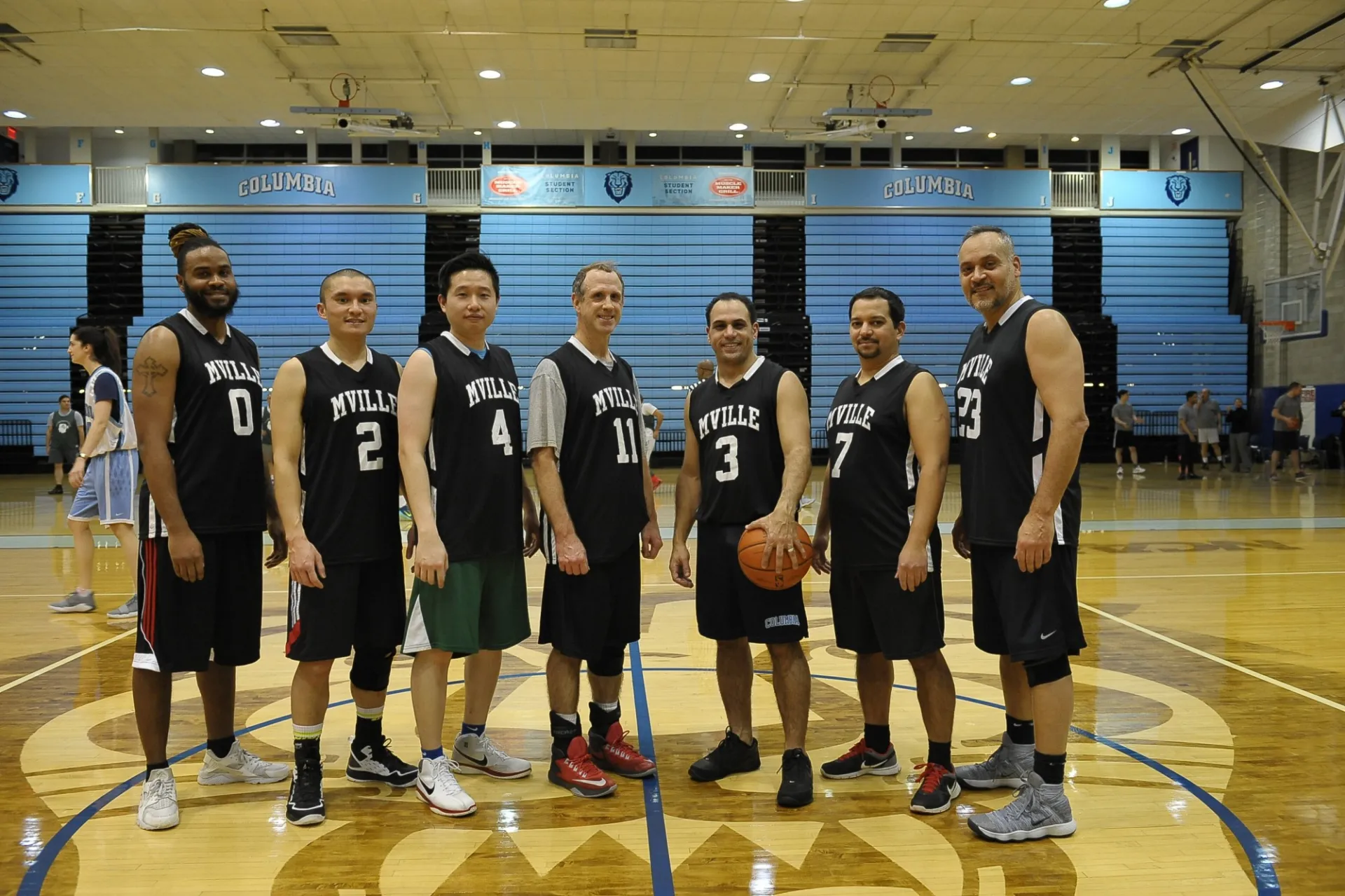 The Manhattanville Group pose together before their game against CUIT.