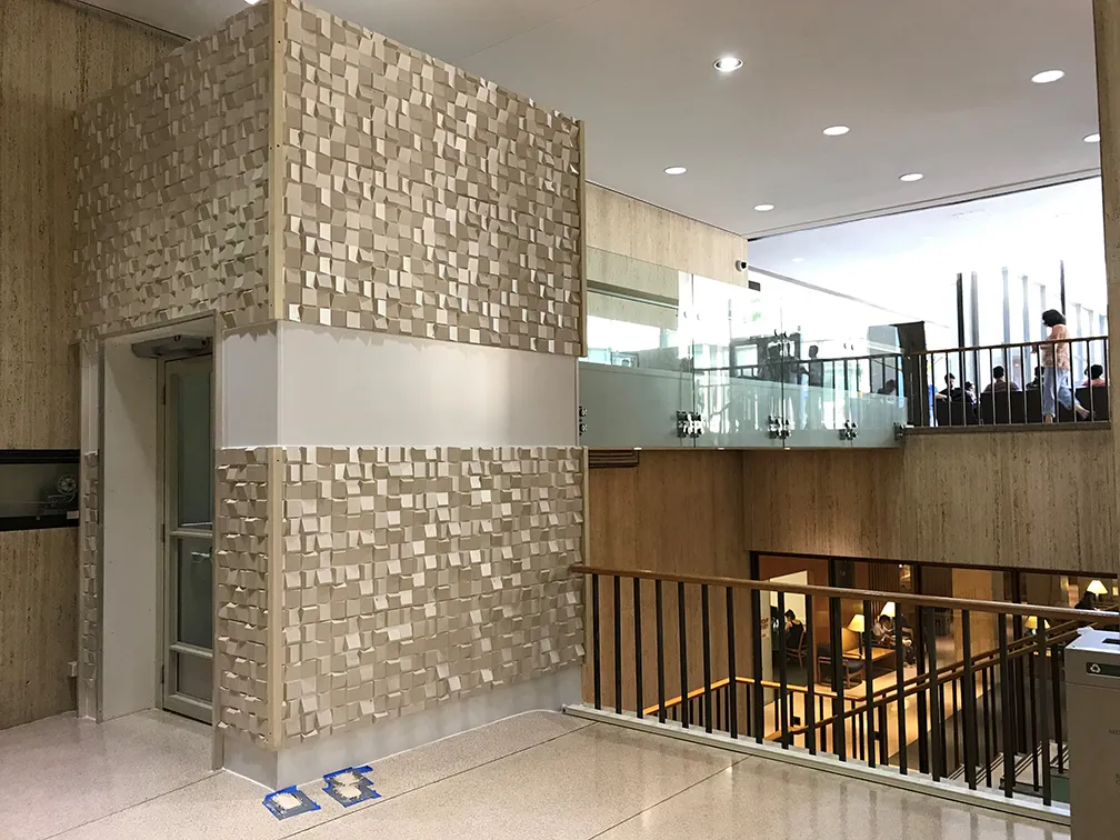 The new wheelchair lift in the International Affairs Building connects the lower and upper levels of the fourth floor.