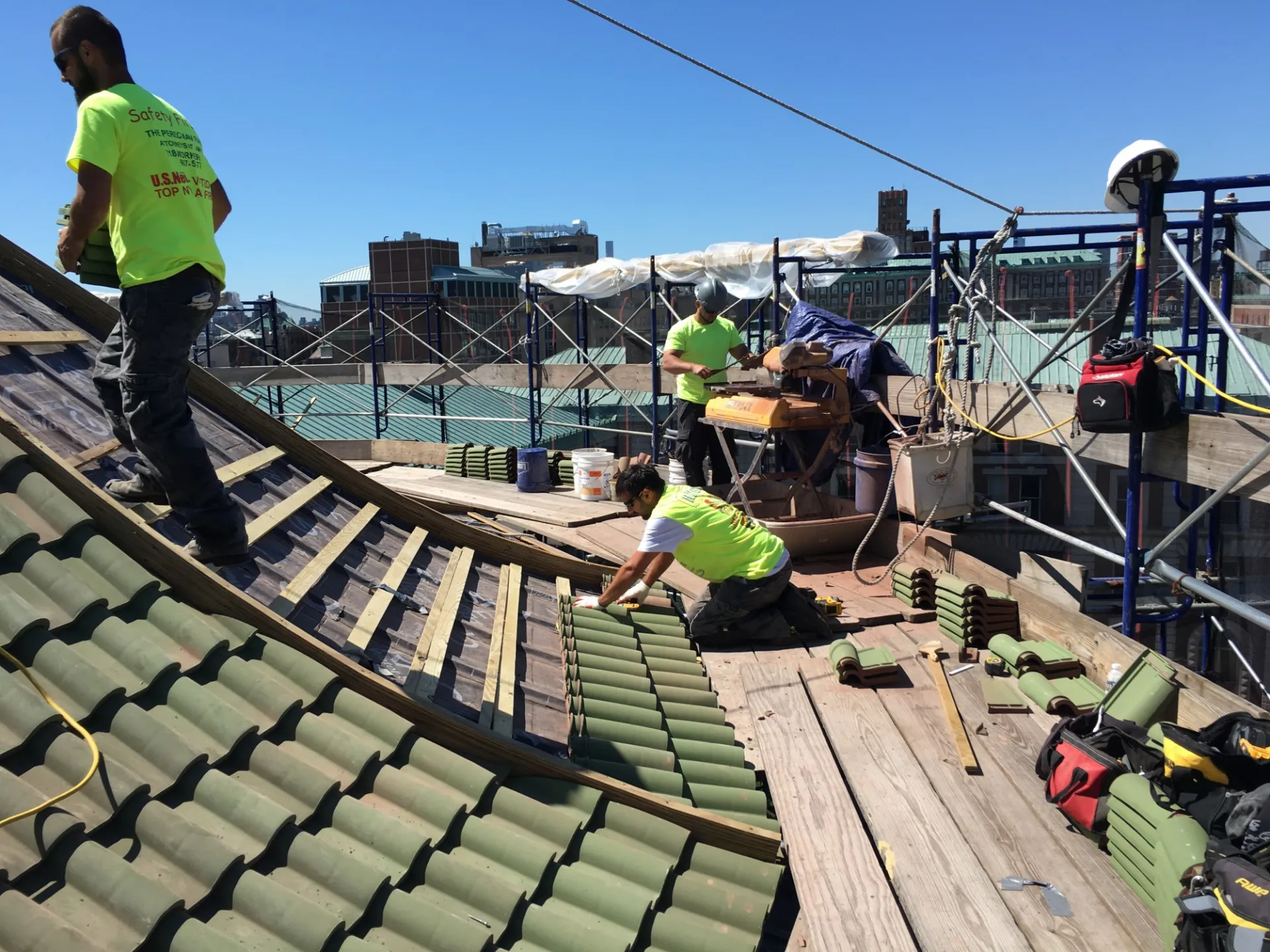 Installation of the replacement tiles, crafted from the original molds, commenced in July