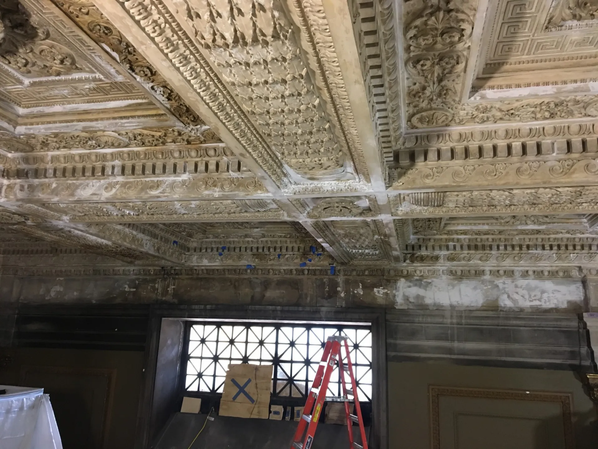 View of a larger section of plaster ceiling repairs.