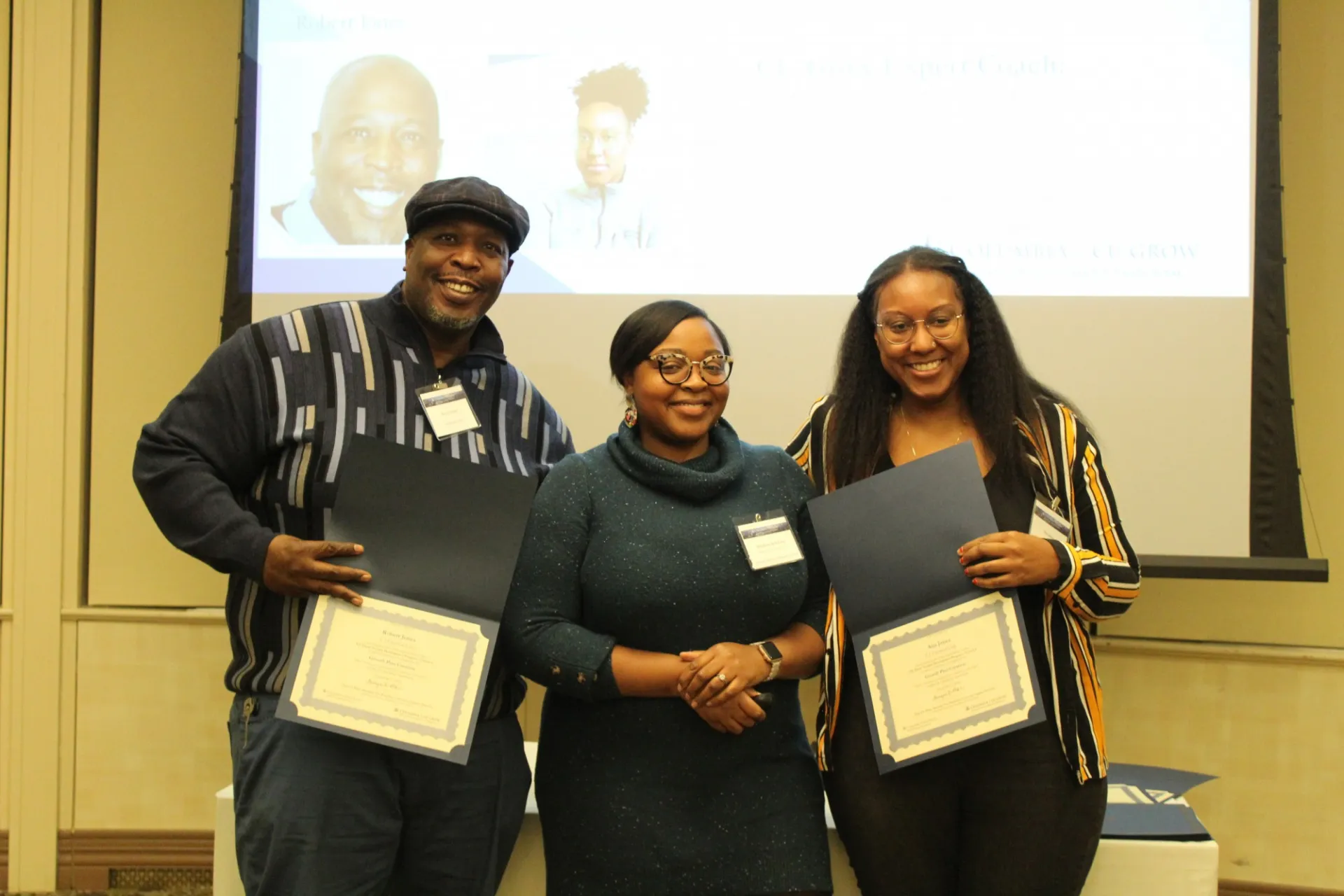 Father and daughter, Robert and Aija Jones from F.I. Electrical pose with a photo with Scharlene de La Cruz