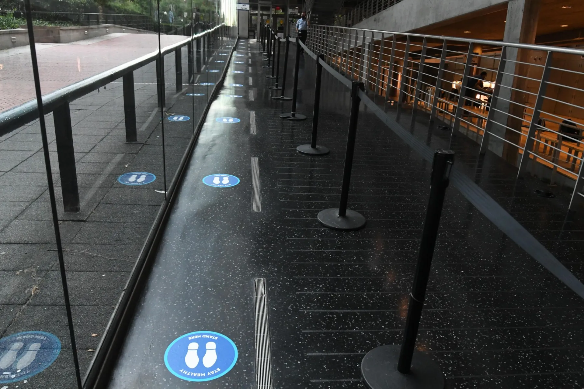 Floor signage for physical distancing inside Lerner Hall