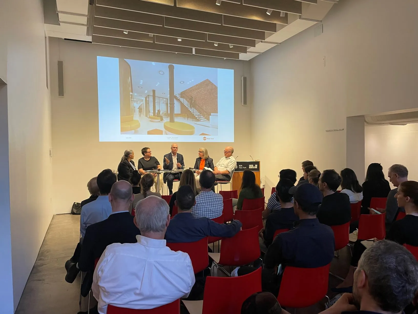 Wright (center) at the AIA panel on June 1, 2023.