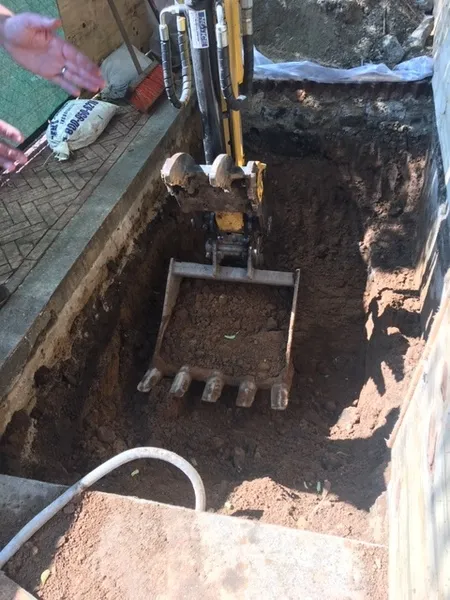 Excavation in progress for the bollards replacement at College Walk and Amsterdam Avenue