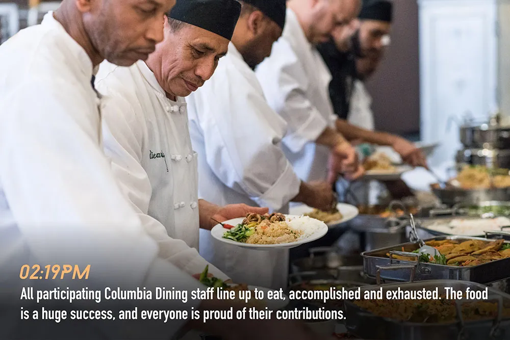 Staff line up to eat