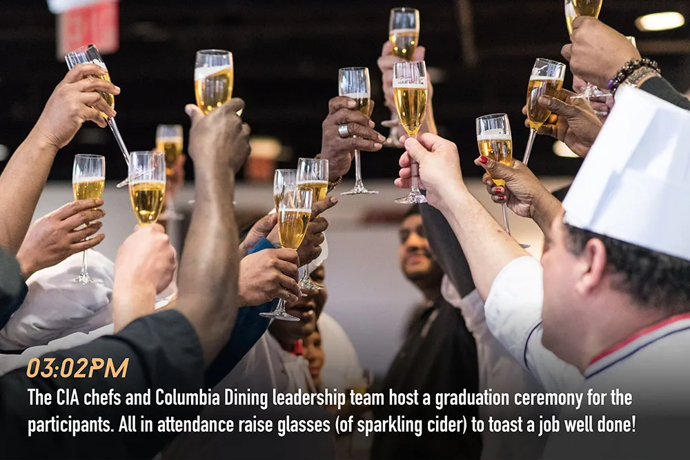 All raise glasses of sparkling cider