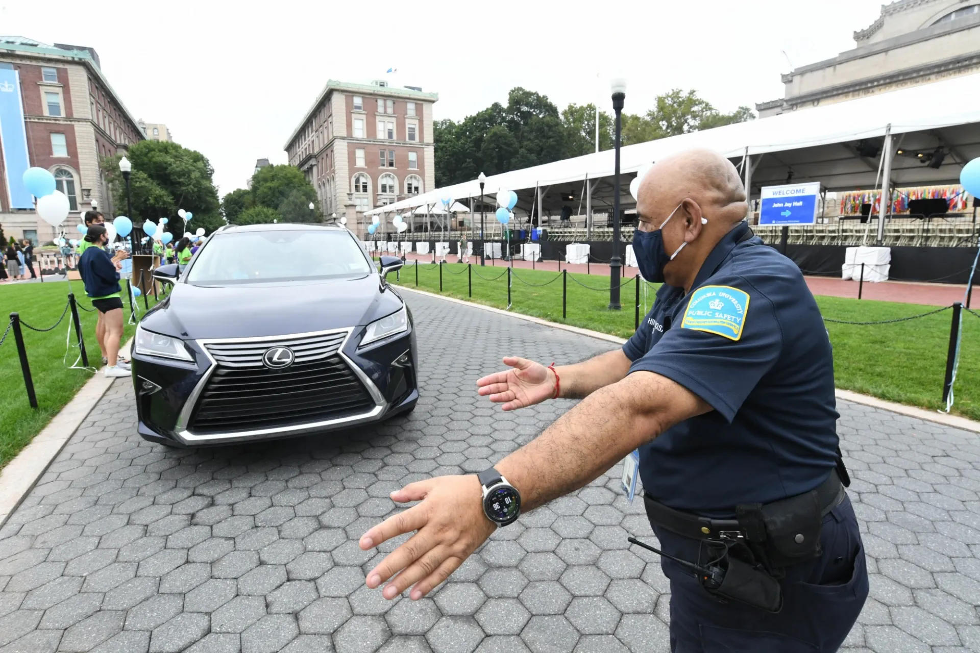 Public Safety officer directs traffic on College Walk