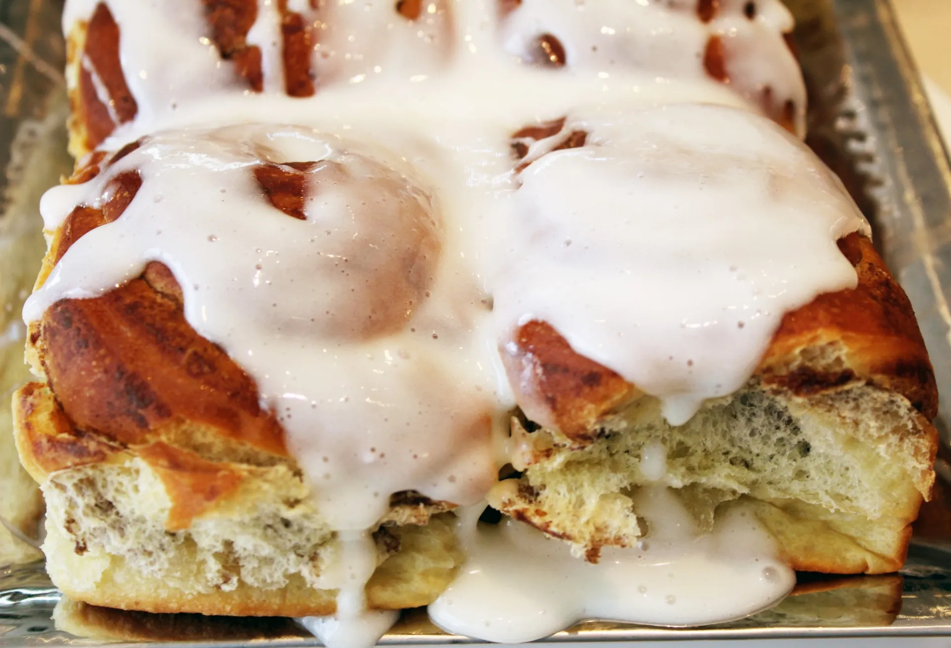 Warm cinnamon rolls topped with icing