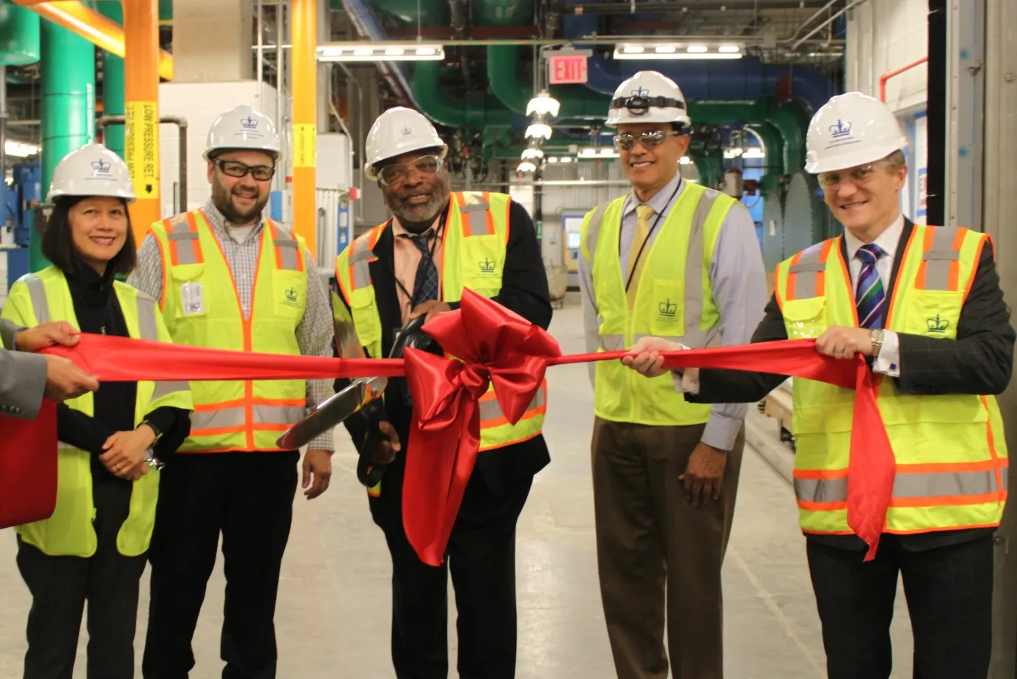 Members of Columbia’s Manhattanville team cut a ribbon during an event in May at the Central Energy Plant in recognition of achieving the first temporary certificate of occupancy at the Manhattanville campus. The Central Energy Plant is a below grade facility that provides chilled water, high pressure steam and normal electric power across the Manhattanville campus.