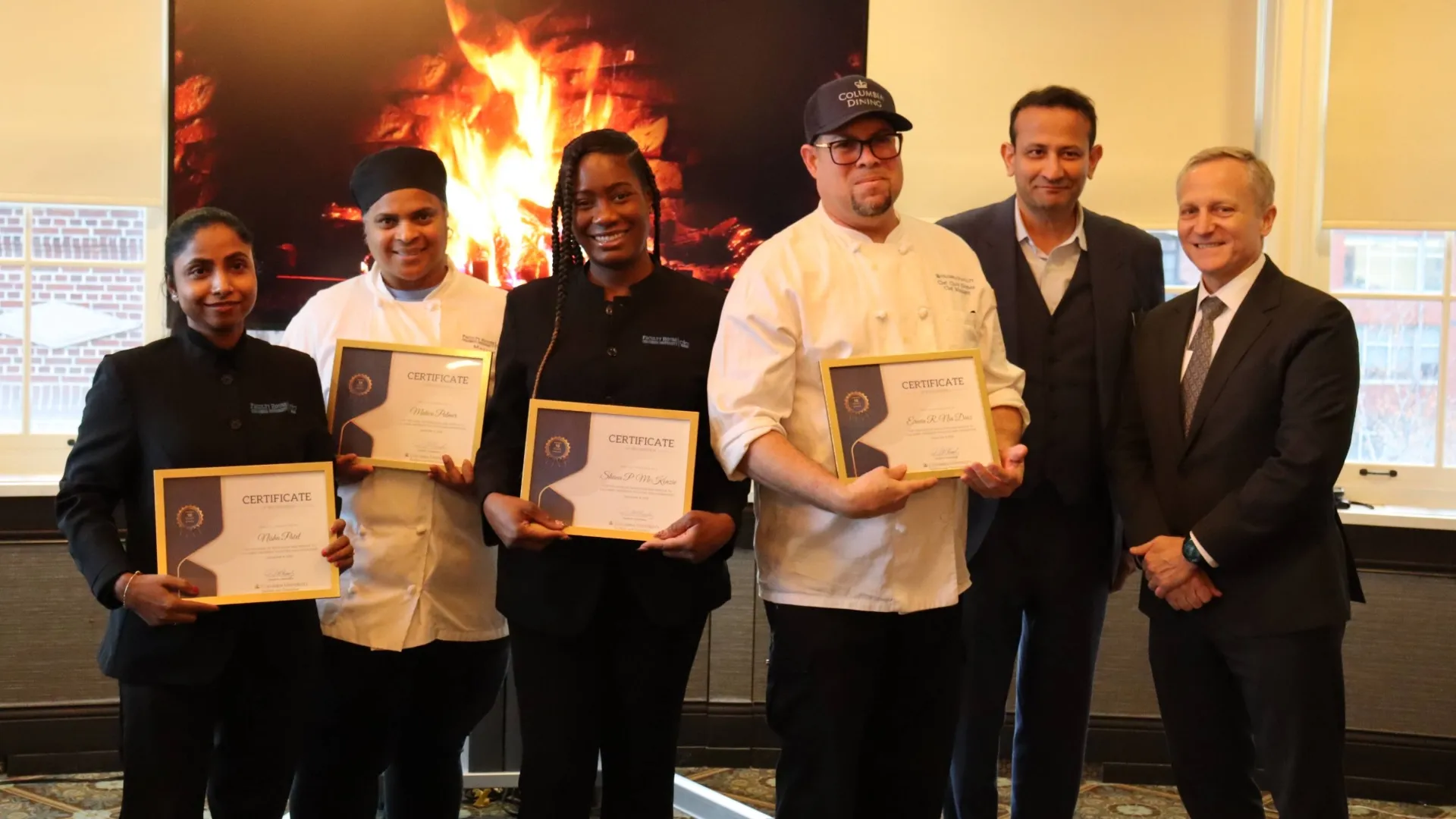 Group photo of the Event Management team receiving certificates.