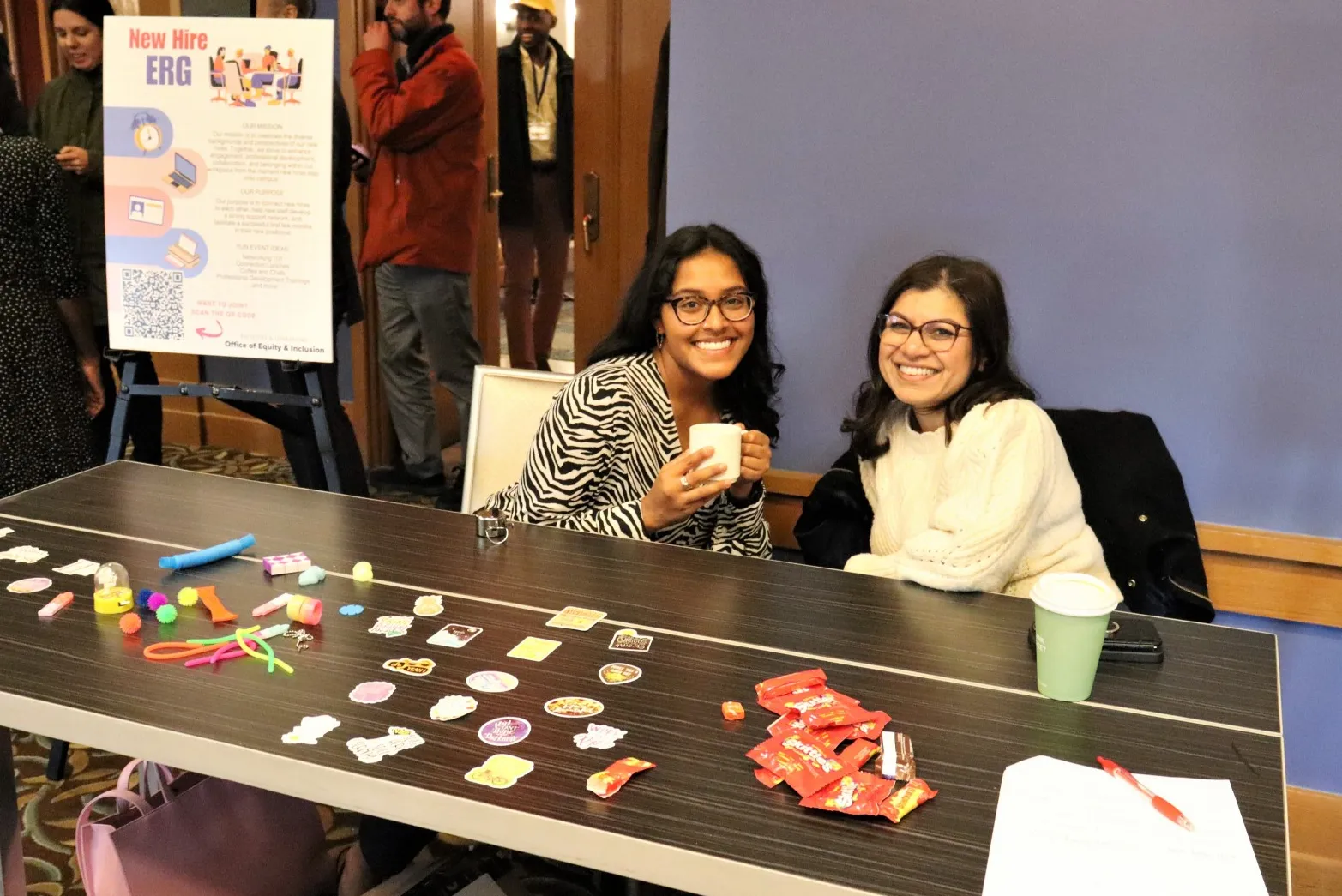 Sobia Khokhar and Sheetal Kale tabling and sharing information for the New Hire employee resource group