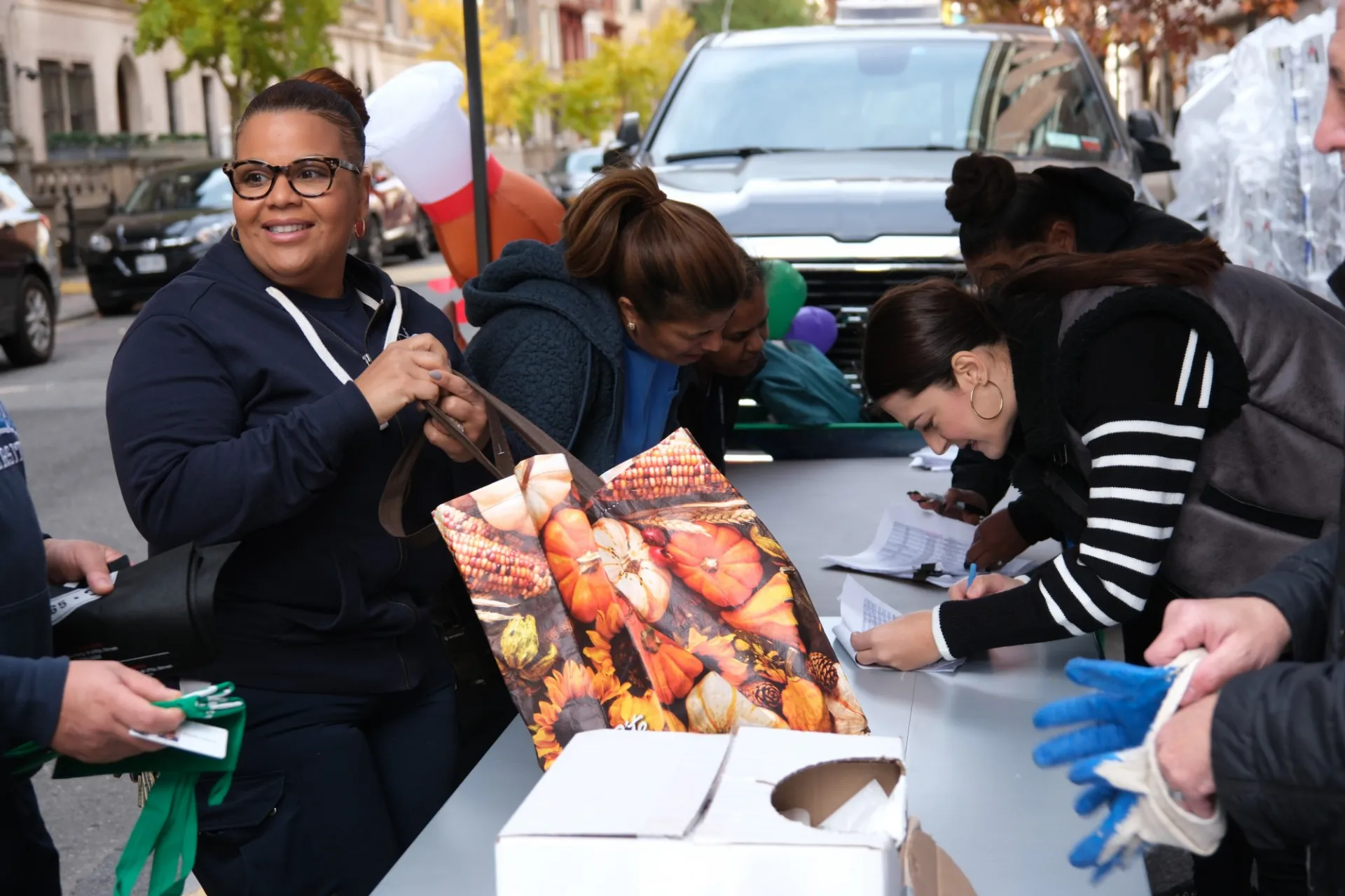 Facilities and Operations employee picking up frozen dish