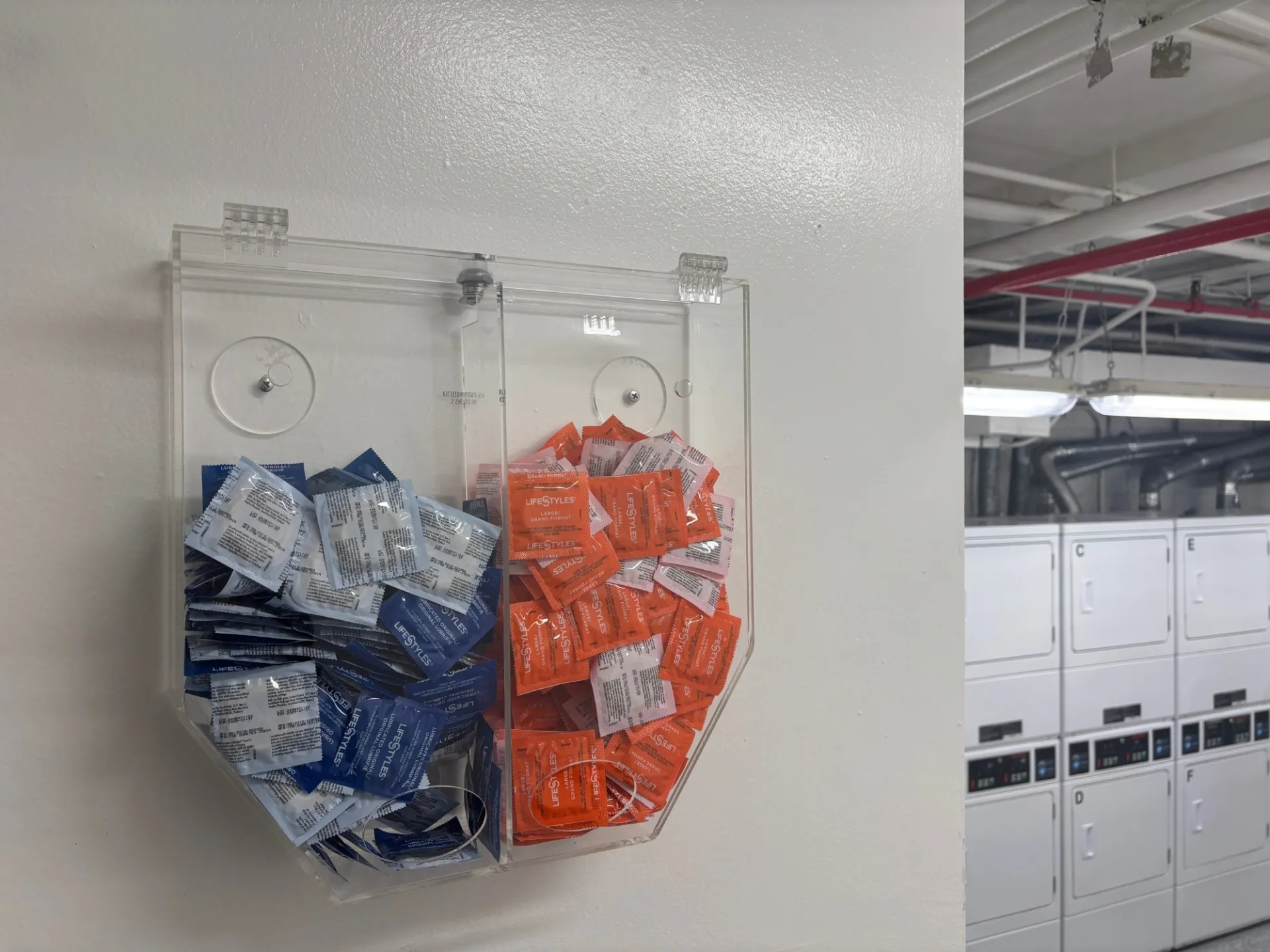 Condom dispenser