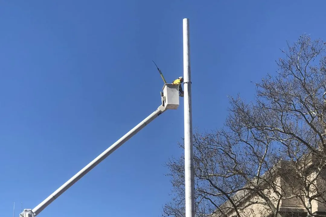 Removal of east flagpole