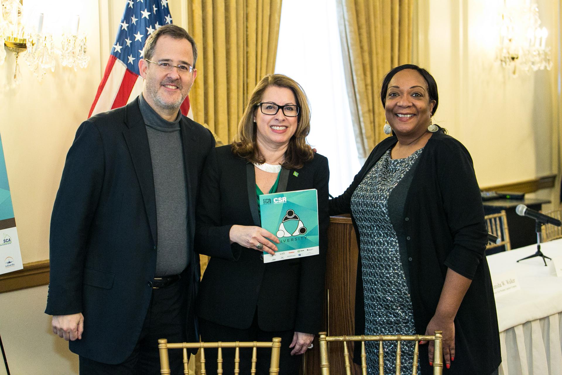 Tanya Pope (right) receives CSR award Tanya Pope receiving the City & State Corporate Social Responsibility Award for Advancing Diversity