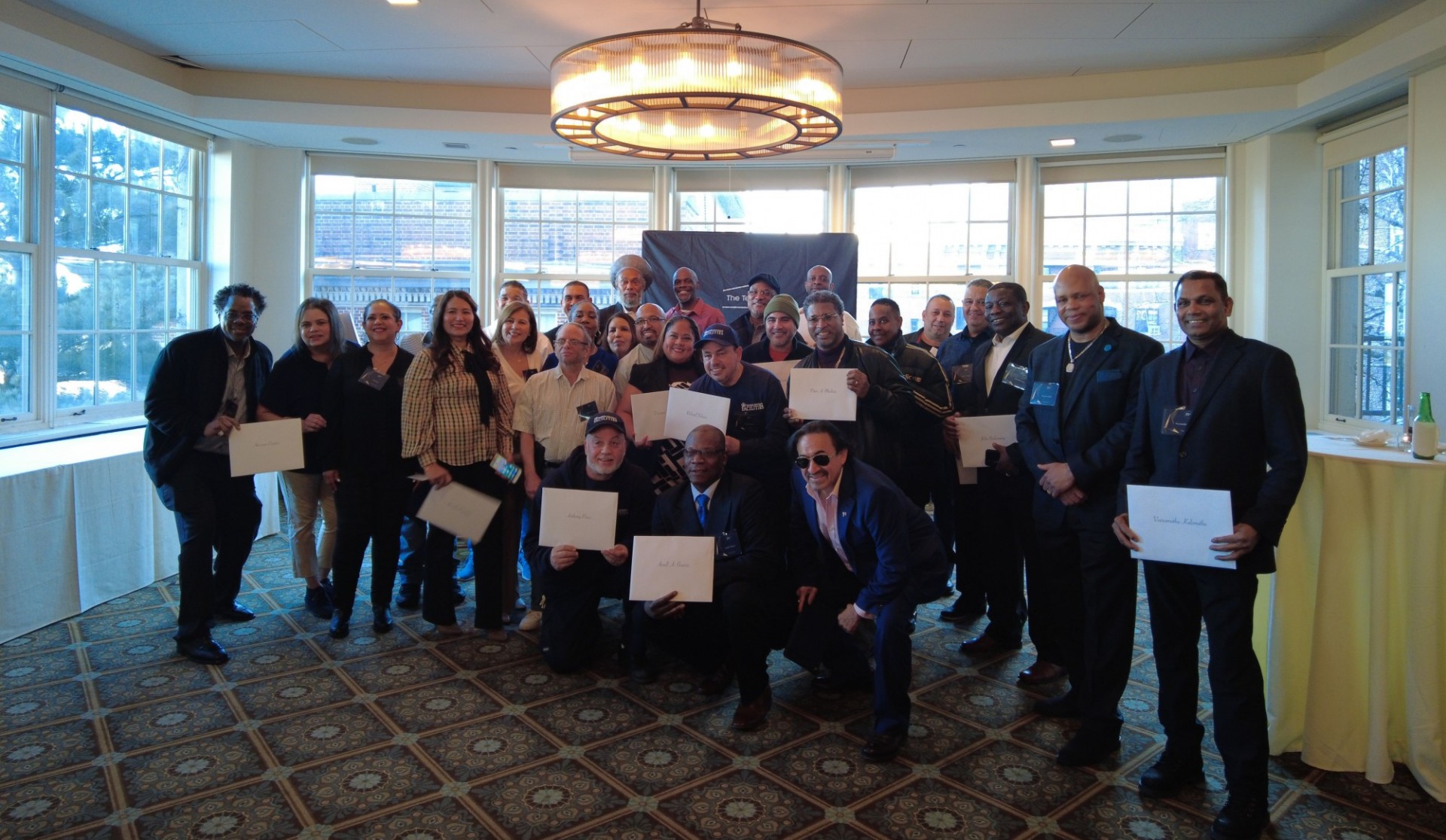 Fifty-five Facilities and Operations employees who celebrated their 25-year milestone anniversary in 2021, 2022, and 2023 were inducted into Columbia's 25-year club. 25 year club inductees pose for a photo in Columbia's Faculty House