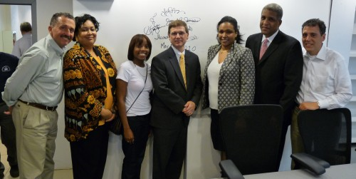 Jean and Juana Gauthier (third and second from farthest right) of Innovative Business Solutions with Columbia University Executive Vice President Joe Ienuso (center) and members of the Columbia University project team after signing their names to a wall, signifying that they stand behind their work. Jean and Juana Gauthier (third and second from farthest right) of Innovative Business Solutions with Columbia University Executive Vice President Joe Ienuso (center) and members of the Columbia University project team after signing their names to a wall, signifying that they stand behind their work.