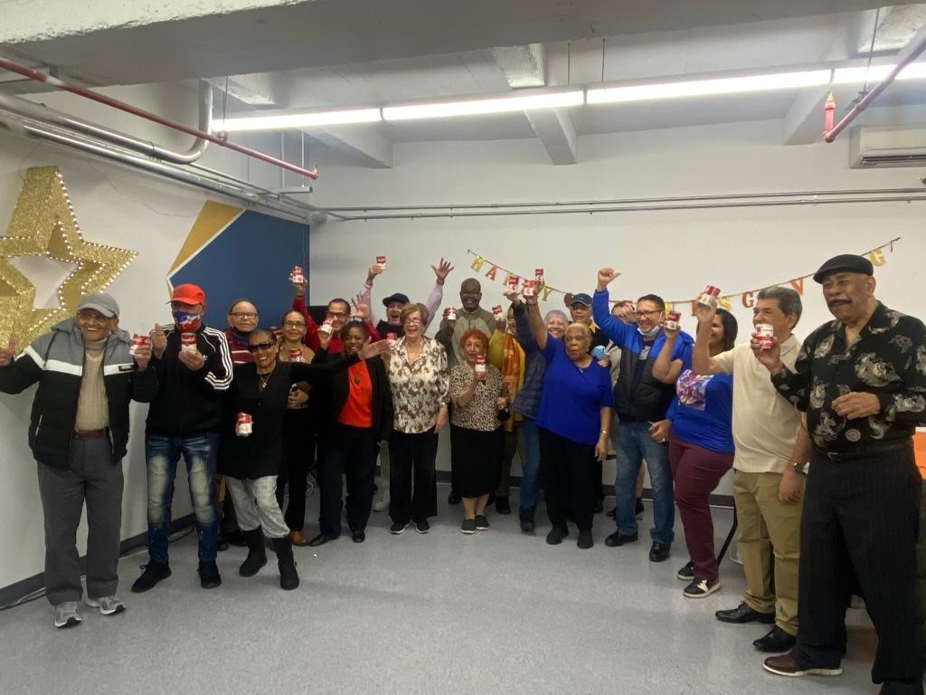 CUFO helped to coordinate the delivery of soup donations sponsored by Skanska USA to five neighborhood senior centers including ARC XVI Fort Washington Seniors Center. Members of ARC XVI Fort Washington Seniors Center pose for a photo