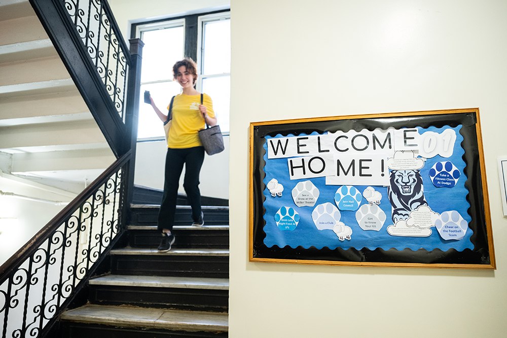 A student heads down the stairwell in a Columbia residence hall. Photo by Diane Bodareff A student heads down the stairwell in a Columbia residence hall.