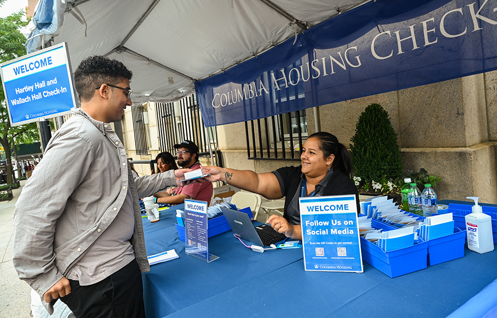 The Housing team staffed Check-In stations at each First-Year residence hall, helping new students with their arrival. Photo by Diane Bondareff The Housing team staffed Check-In stations at each First-Year residence hall, helping new students with their arrival. Photo by Diane Bondareff