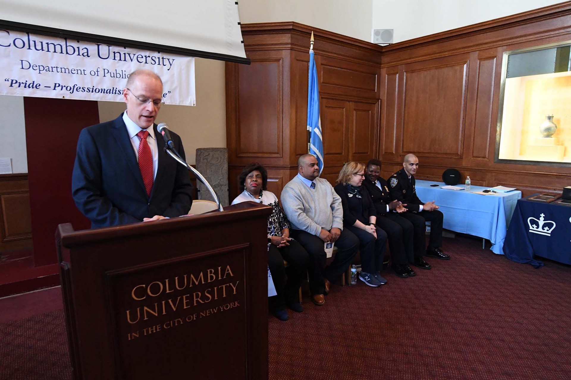 Al Becker speaks at the podium of the Public Safety Awards ceremony