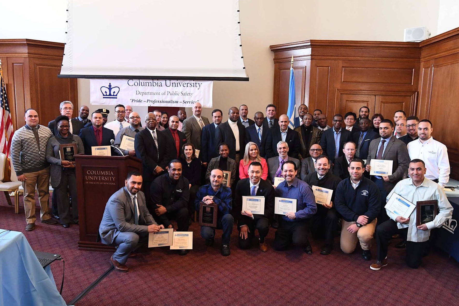 Awardees pose for group photo at the ceremony