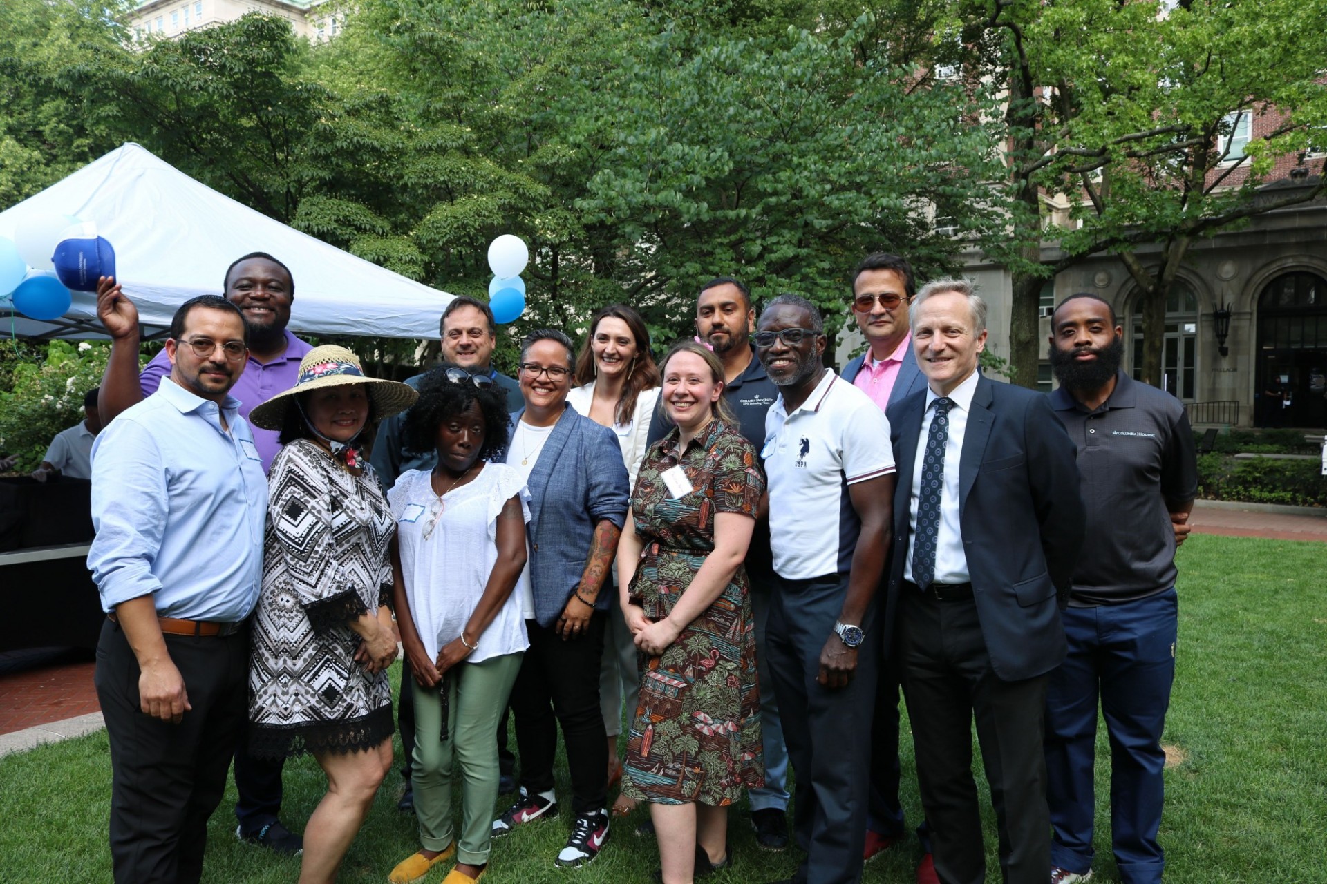 CUFO's Equity & Inclusion Council hosted an ice-cream social for employees to celebrate the one-year anniversary of the council on July 13. group photo of CUFO's E&I Council outside of John Jay Hall