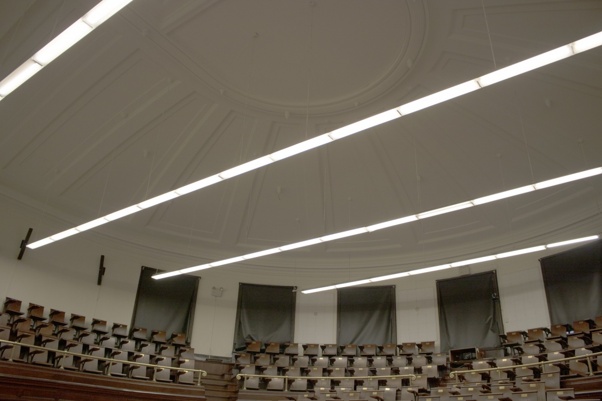 Work in Havemeyer 309 included a refresh of the ceiling with new paint. The dome ceiling of Havemeyer 309 with large lights.