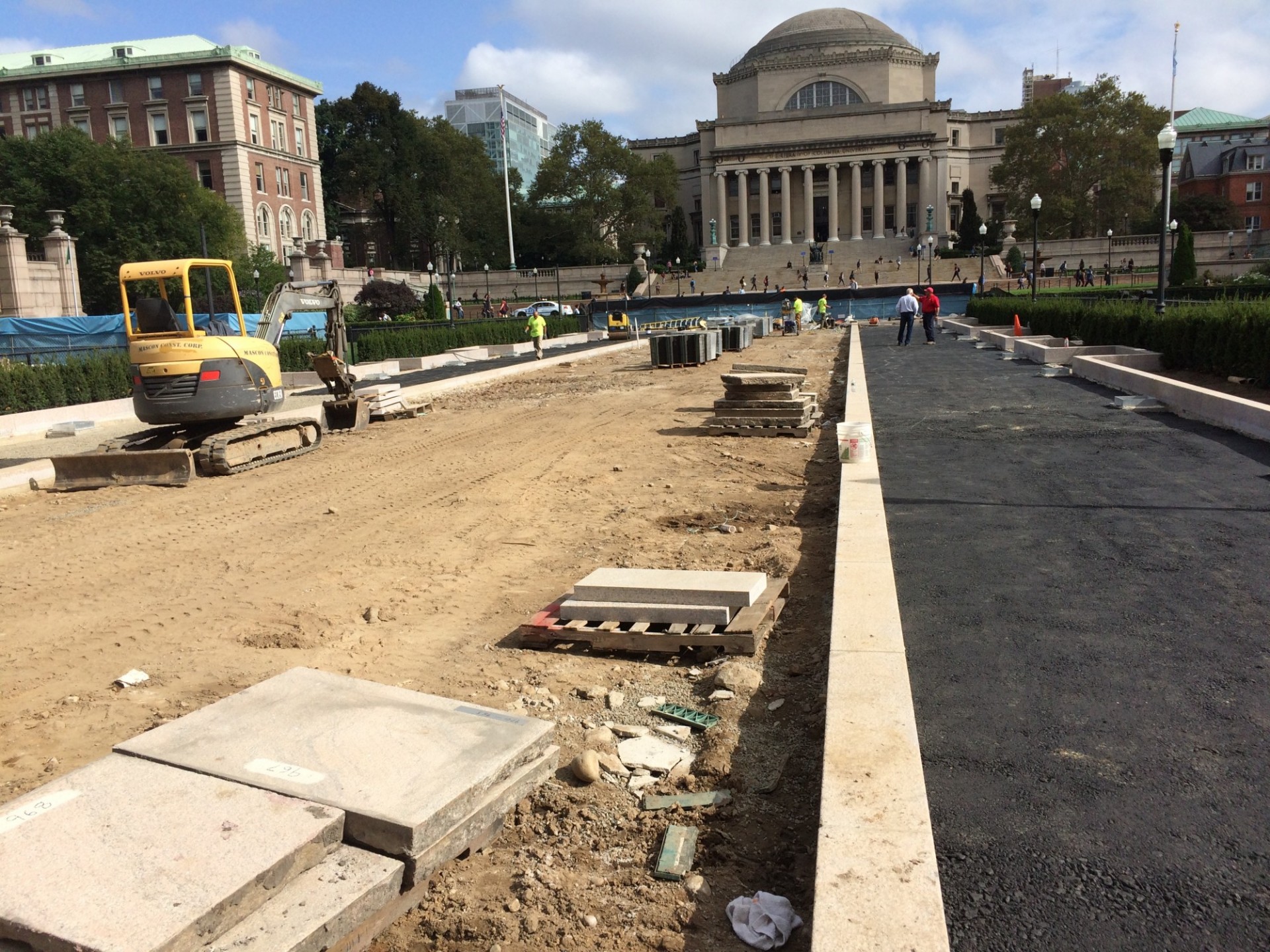East and west walkway sub-layers are being installed. Eventually, pathways will have black hexagonal pavers to match College Walk. (Photo from September 19, 2017)