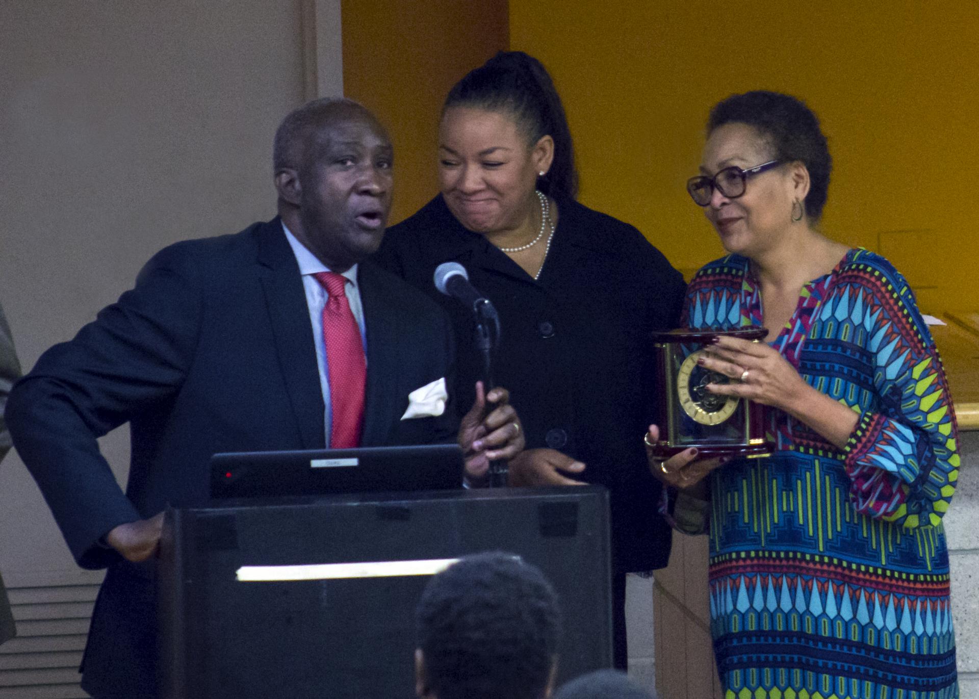 Lloyd Williams, president and CEO of the Greater Harlem Chamber of Commerce, presenting the Outstanding Professional Achievement Award to La-Verna Fountain (right)