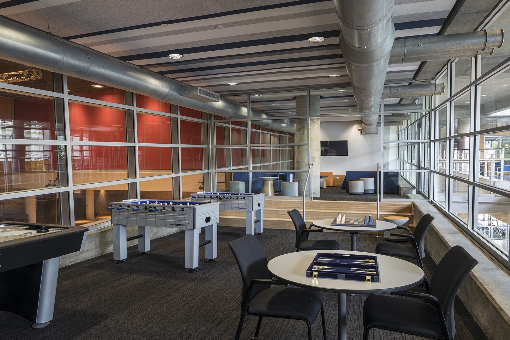 The new Lerner Hall student lounge includes a game room featuring air hockey and foosball tables plus other games like giant Jenga, giant Connect 4, chess, and Legos. (Photo: Andrew Rugge) The new Lerner Hall student lounge includes a game room featuring air hockey and foosball tables plus other games like giant Jenga, giant Connect 4, chess, and Legos. (Photo: Andrew Rugge)