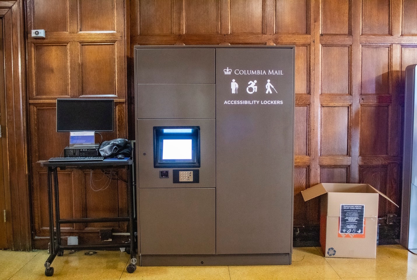 Accessibility package locker against wall.