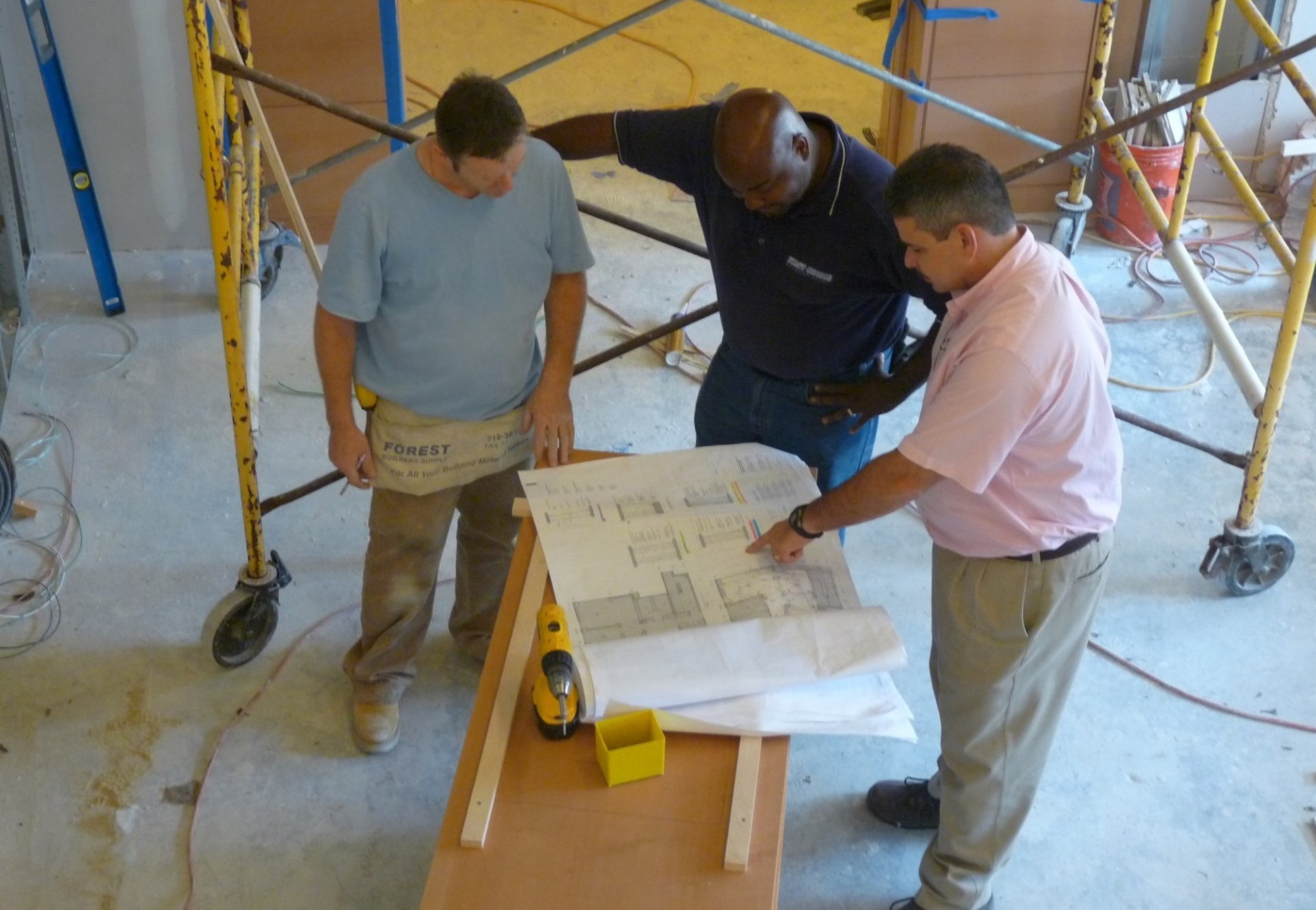 Two program mentee firms, First Choice Mechanical and Corinthian Construction Company, working together on a project at Columbia. Two program mentee firms, First Choice Mechanical and Corinthian Construction Company, working together on a project at Columbia.