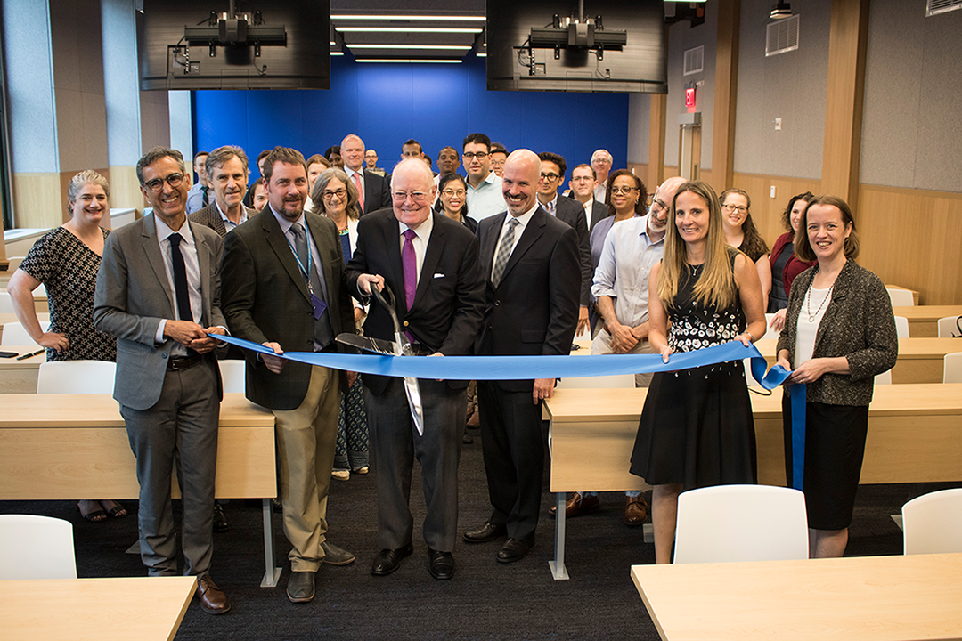 In 402 Chandler, Provost John Coatsworth, center, cuts the ribbon held by CUFO Executive Director for Space Planning Eugene Villalobos, Project Manager Jason Cea, Executive Vice Provost Troy Eggers, Columbia Health AVP and Medical Director Melanie Bernitz, and Deputy Registrar Monica Avitsur In 402 Chandler, Provost John Coatsworth, center, cuts the ribbon held by CUFO Executive Director for Space Planning Eugene Villalobos, Project Manager Jason Cea, Executive Vice Provost Troy Eggers, Columbia Health AVP and Medical Director Melanie Bernitz, and Deputy Registrar Monica Avitsur.
