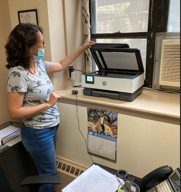 Executive Director for the Riverstone Senior Life Services Ilana Dunner uses new printer to increase efficiency in office operations. Executive Director for the Riverstone Senior Life Services Ilana Dunner poses for a photo using the new printer.