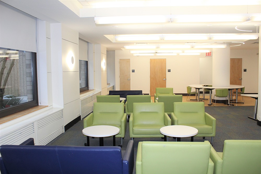 Over winter break, improvements to the Schapiro Hall main lounge included new lighting and painting.