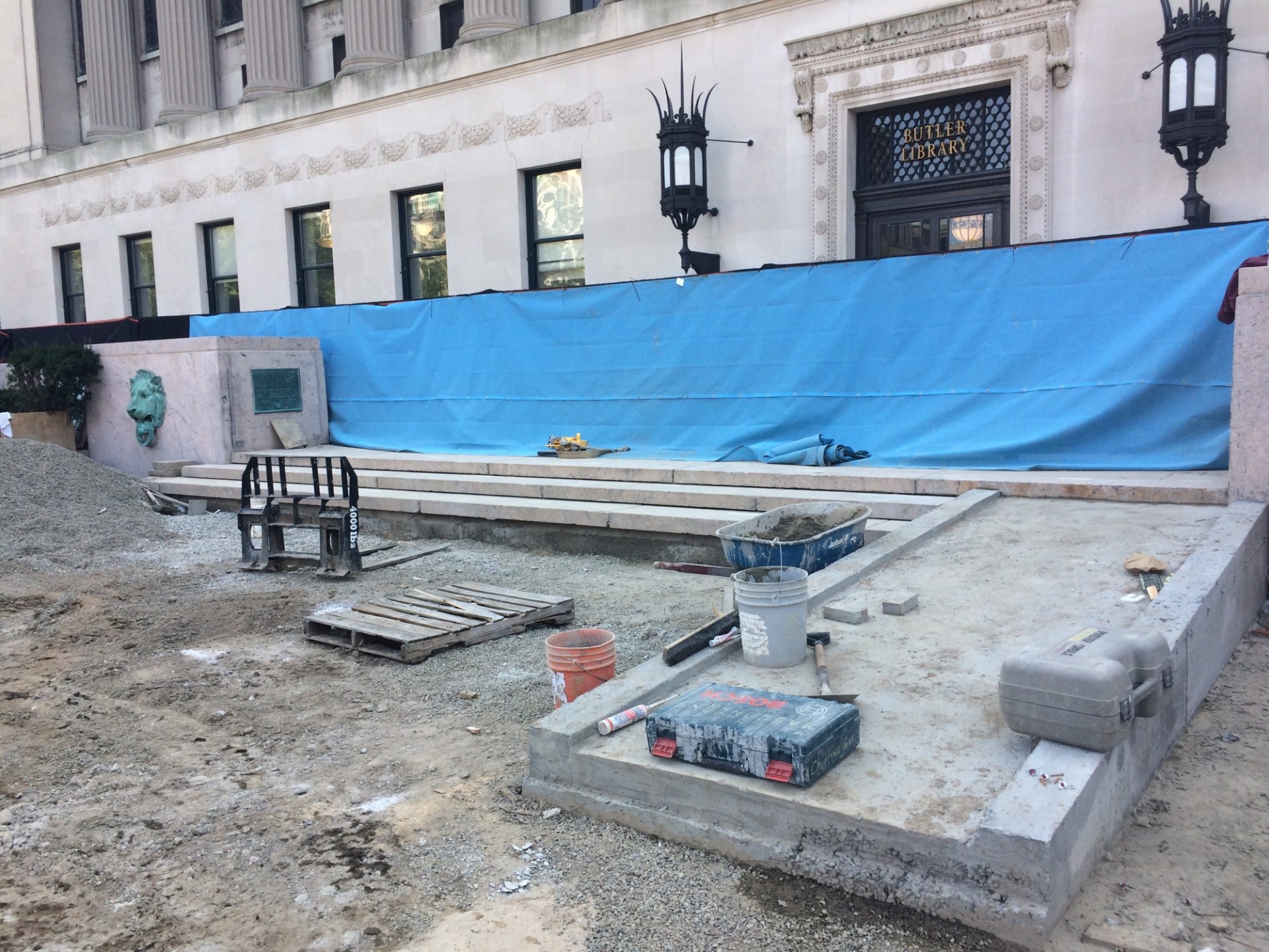 The foundation for a permanent ramp leading from the west walkway to Butler Plaza can be seen at the bottom right of this image. (Photo from September 11, 2017)
