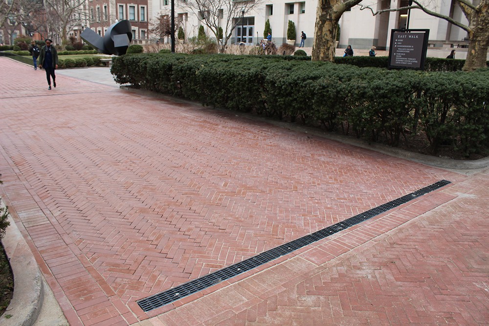 New brick pavers and a trench drain were installed in the pathway leading from Low Library to Avery Hall to provide a more secure walkway. New brick pavers and a trench drain were installed in the pathway leading from Low Library to Avery Hall to provide a more secure walkway.