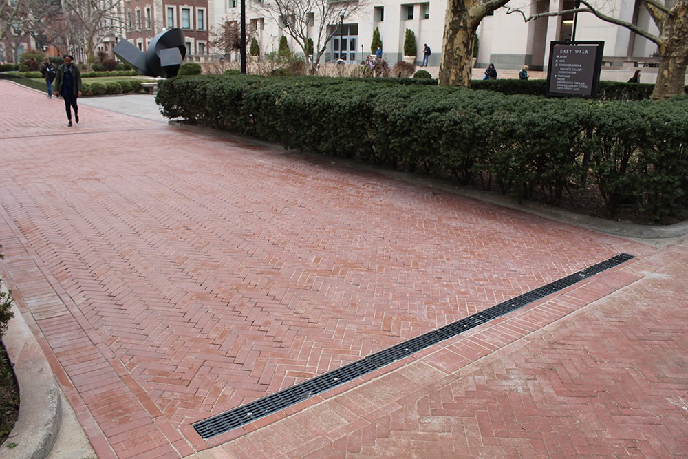 New brick pavers and a trench drain were installed in the pathway leading from Low Library to Avery Hall to provide a more secure walkway.