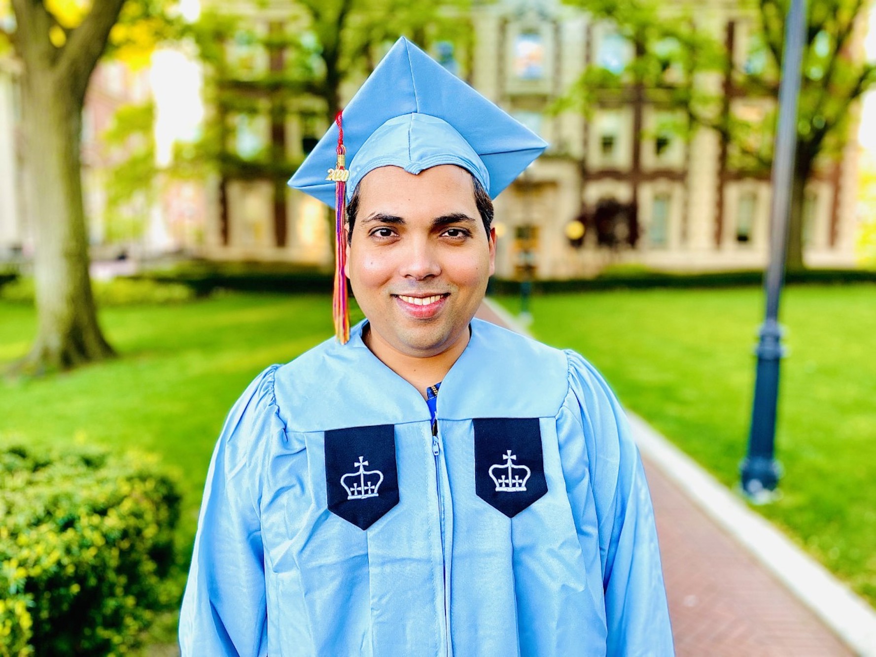 CUFO 2020 Grad with Columbia cap and gown