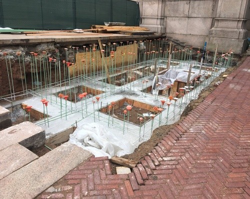 Construction at Low Plaza for the new, permanent ramp between College Walk and Low Plaza, showing rebar and concrete Progress photo of Low Plaza ramp, showing rebar and concrete