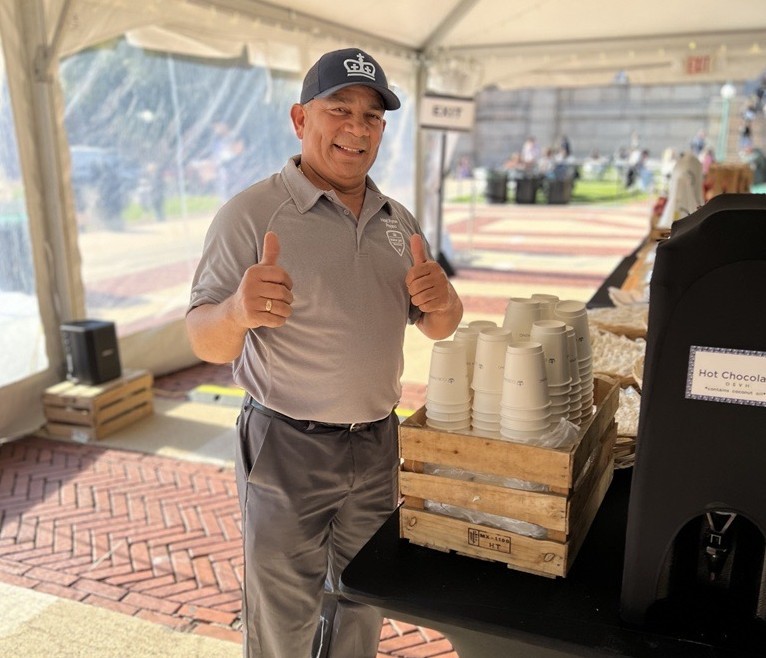A thumbs up from Hector to say the drink stations are ready to go! A staff member gives a thumbs up