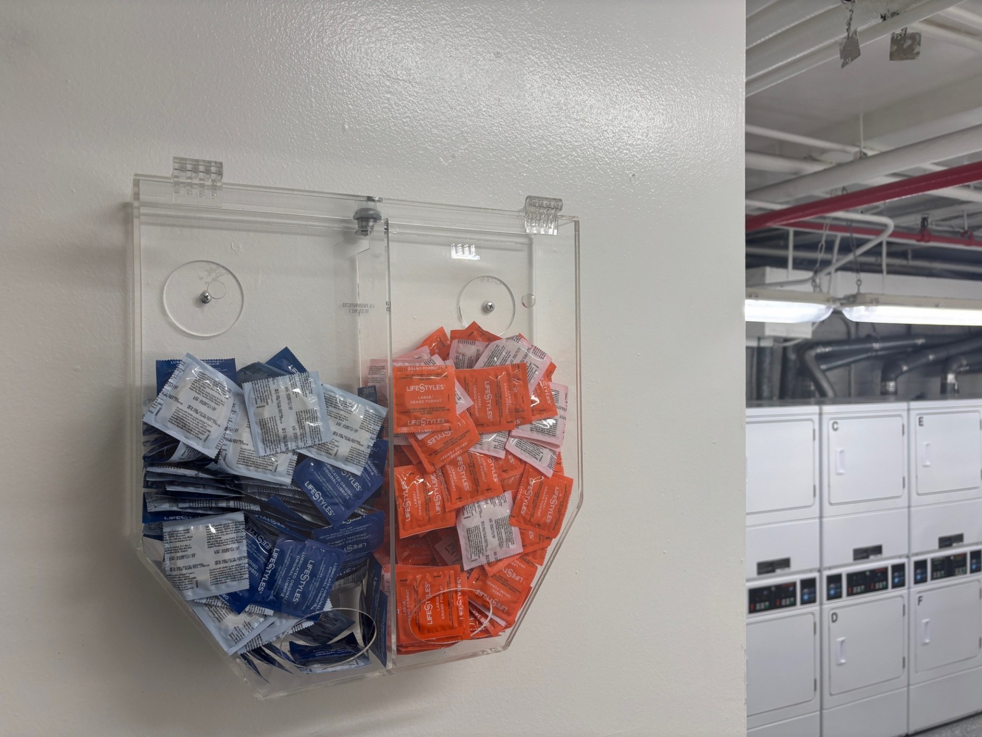 Condom dispenser