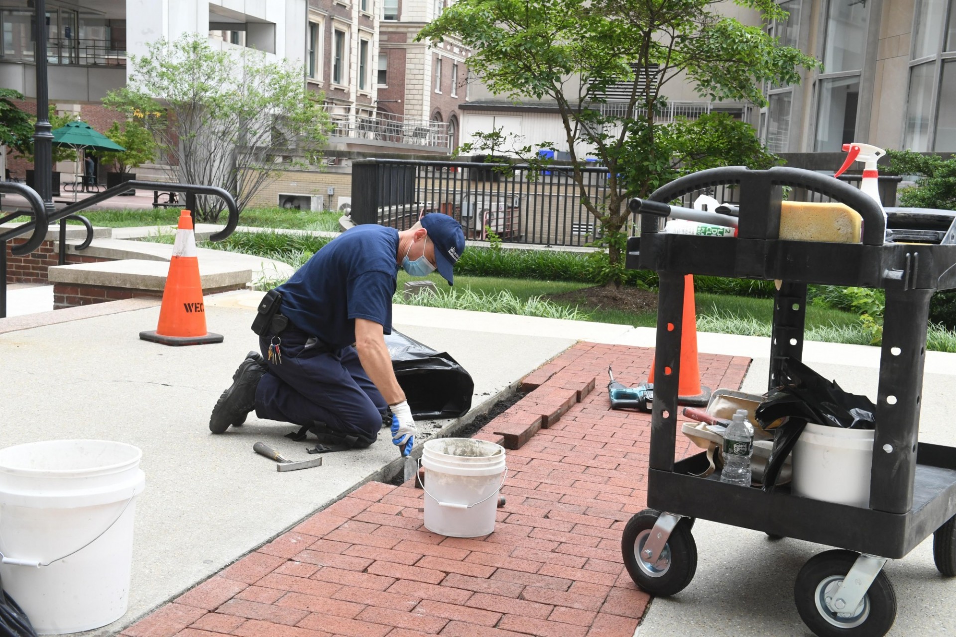 Among the summer projects taking place are repairs to portions of the pathway at various locations on campus. (Photo: Eileen Barroso) Campus Operations is repairing portions of the pathway on various
